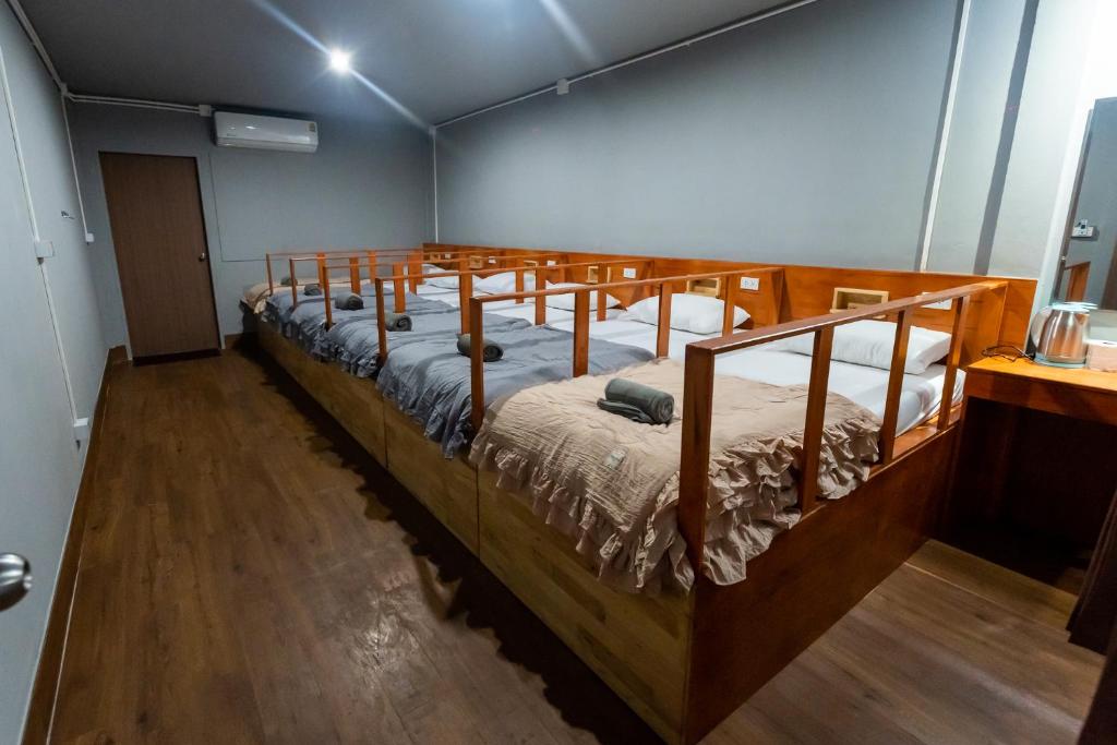 Postel nebo postele na pokoji v ubytování Aladdin Guest House