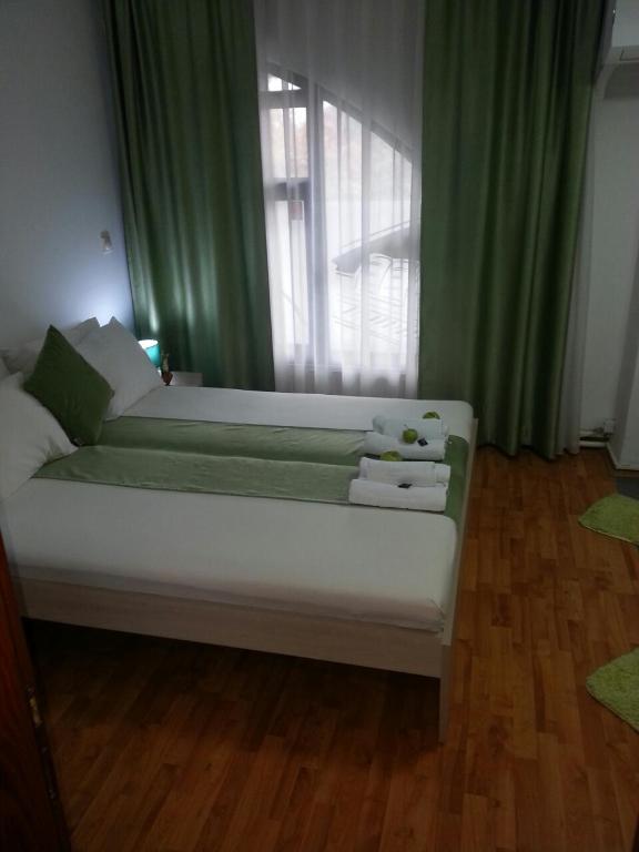 Postel nebo postele na pokoji v ubytování The Bulevard Hotel