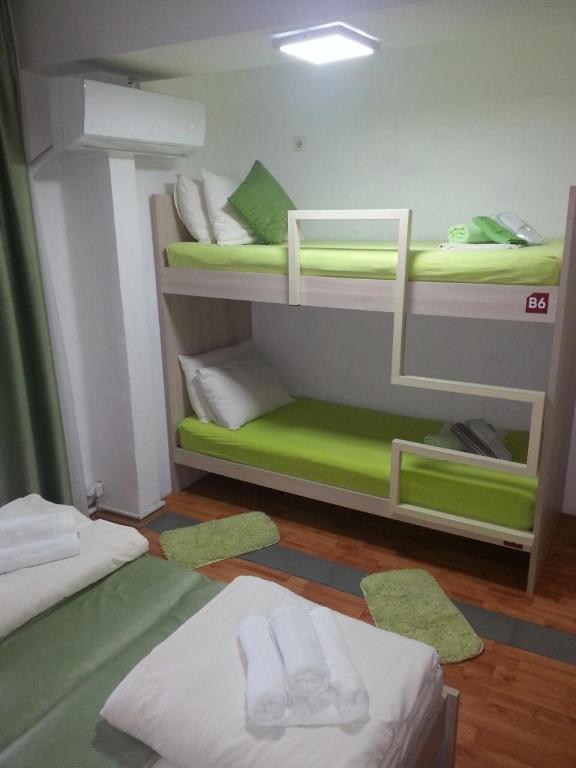Postel nebo postele na pokoji v ubytování The Bulevard Hotel