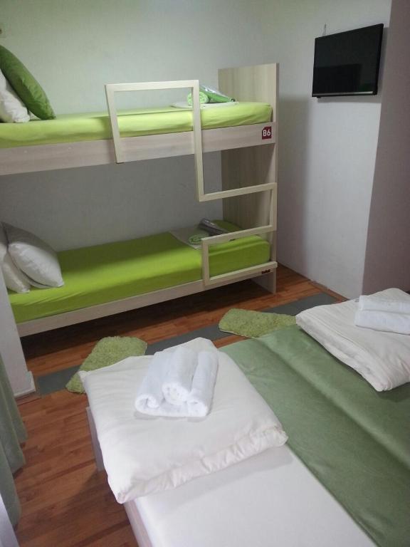Postel nebo postele na pokoji v ubytování The Bulevard Hotel