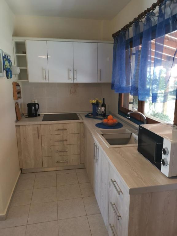 Kuchyňa alebo kuchynka v ubytovaní Orange_Blue_Aparment №1