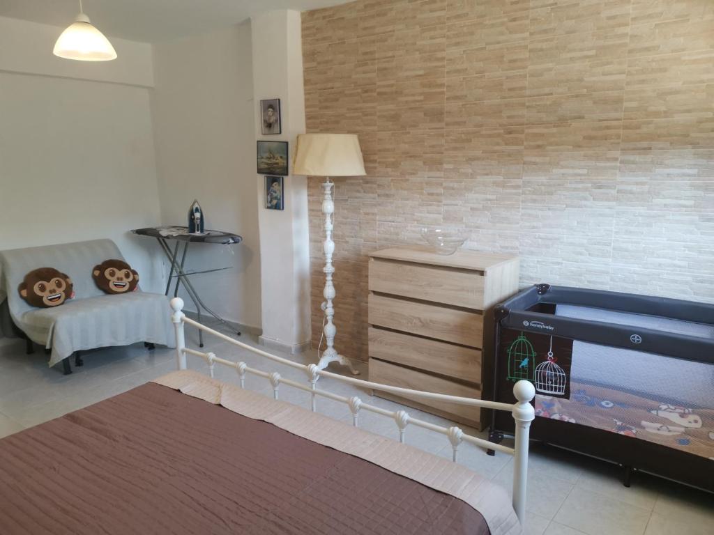 Posteľ alebo postele v izbe v ubytovaní Orange_Blue_Aparment №1