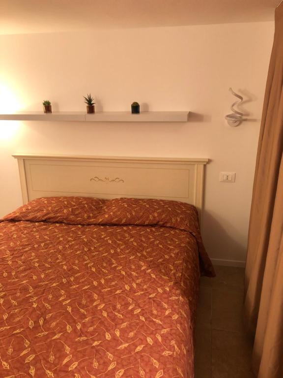 Posteľ alebo postele v izbe v ubytovaní B&B La Terrazza