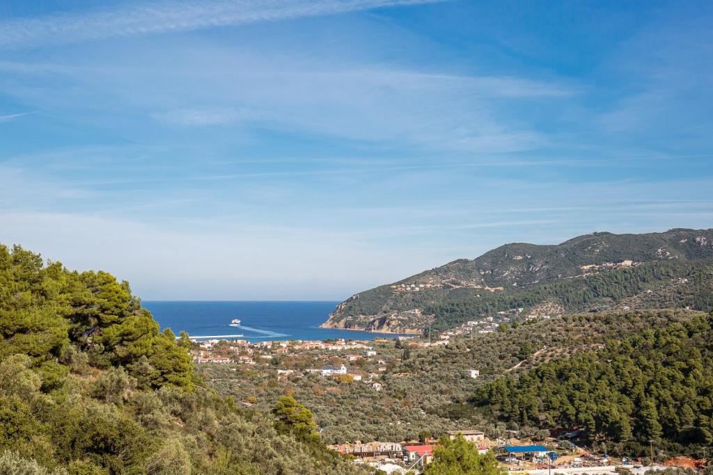 a view of the ocean from a mountain at Aletri Pool Cottage in Skopelos Town
