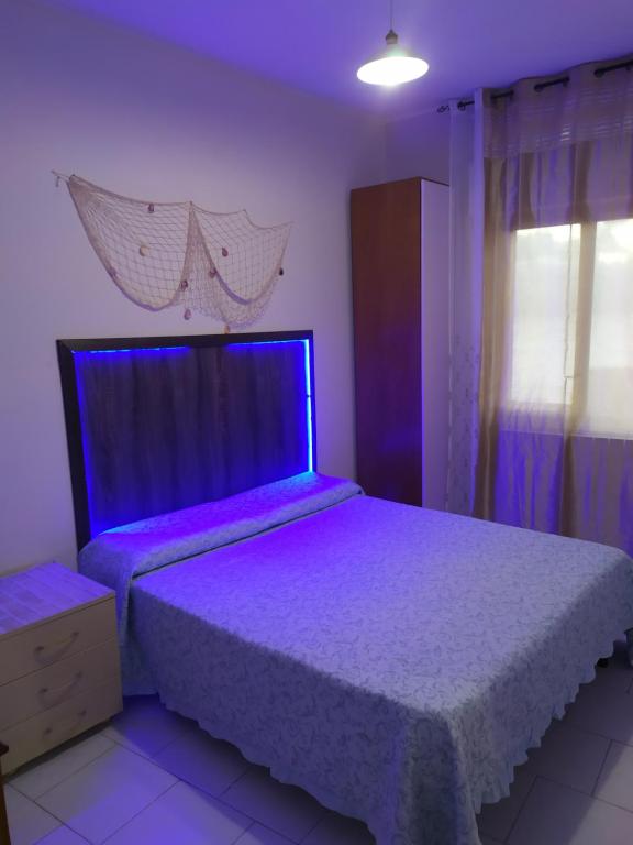 Postel nebo postele na pokoji v ubytování Affittacamere da chris
