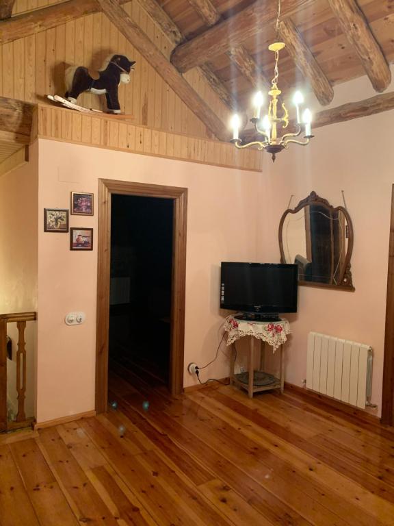 TV a/nebo společenská místnost v ubytování Casa Gely