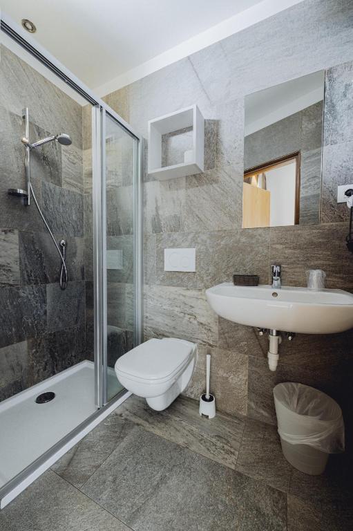 Koupelna v ubytování Hotel Raffl