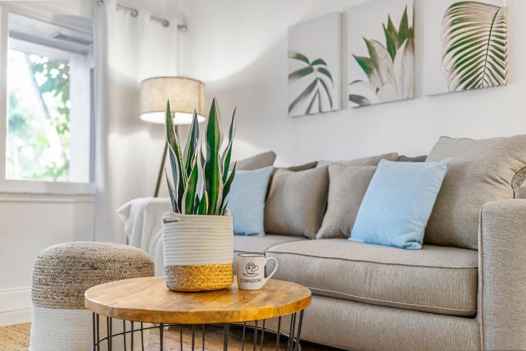 a living room with a couch and a coffee table at Alani Bay Premium Condos in Fort Lauderdale