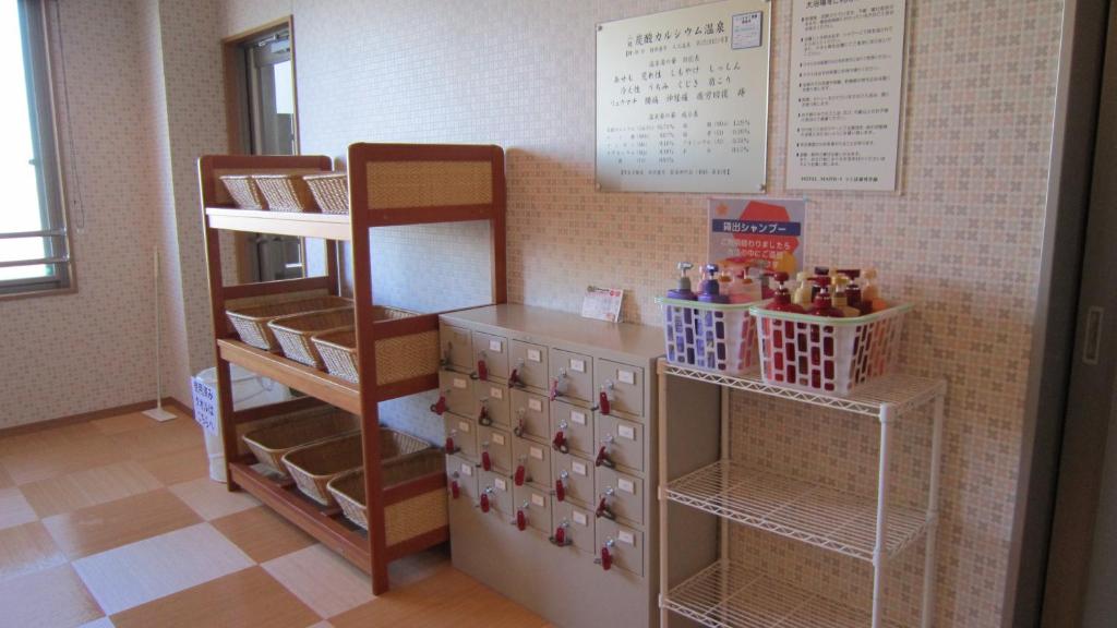 Palanda nebo palandy na pokoji v ubytování Hotel Mark-1 Tsukuba