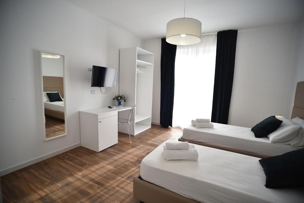Posteľ alebo postele v izbe v ubytovaní Mapi’s Rooms