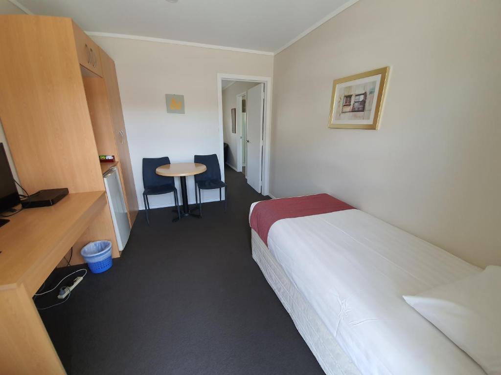 Postel nebo postele na pokoji v ubytování Ocean Inn Motel