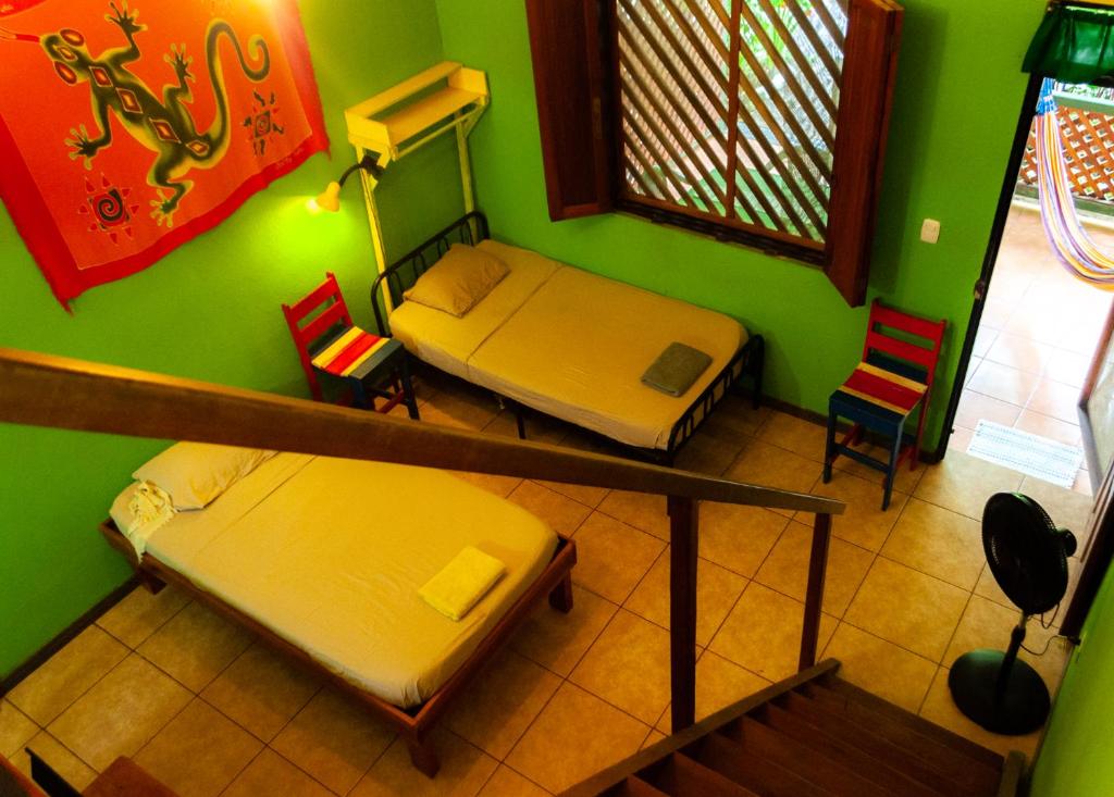 Postel nebo postele na pokoji v ubytování Casitas La Playa