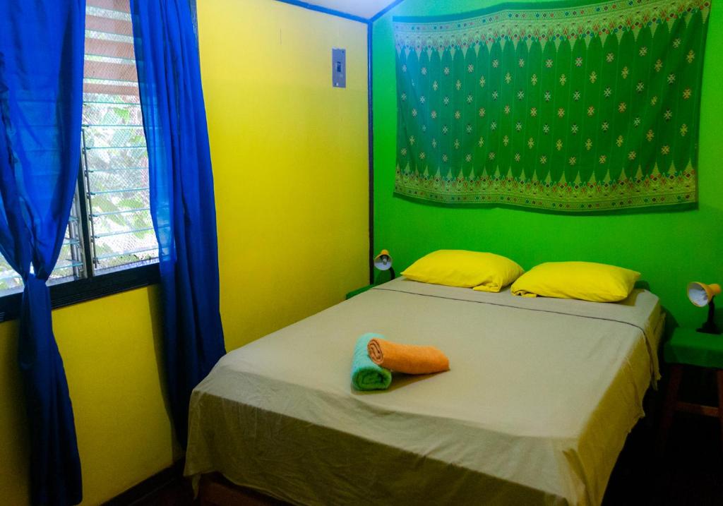 Postel nebo postele na pokoji v ubytování Casitas La Playa