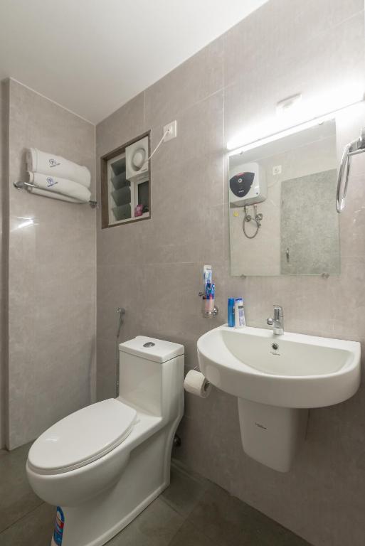 Koupelna v ubytování Manipal Atalia Service Apartments
