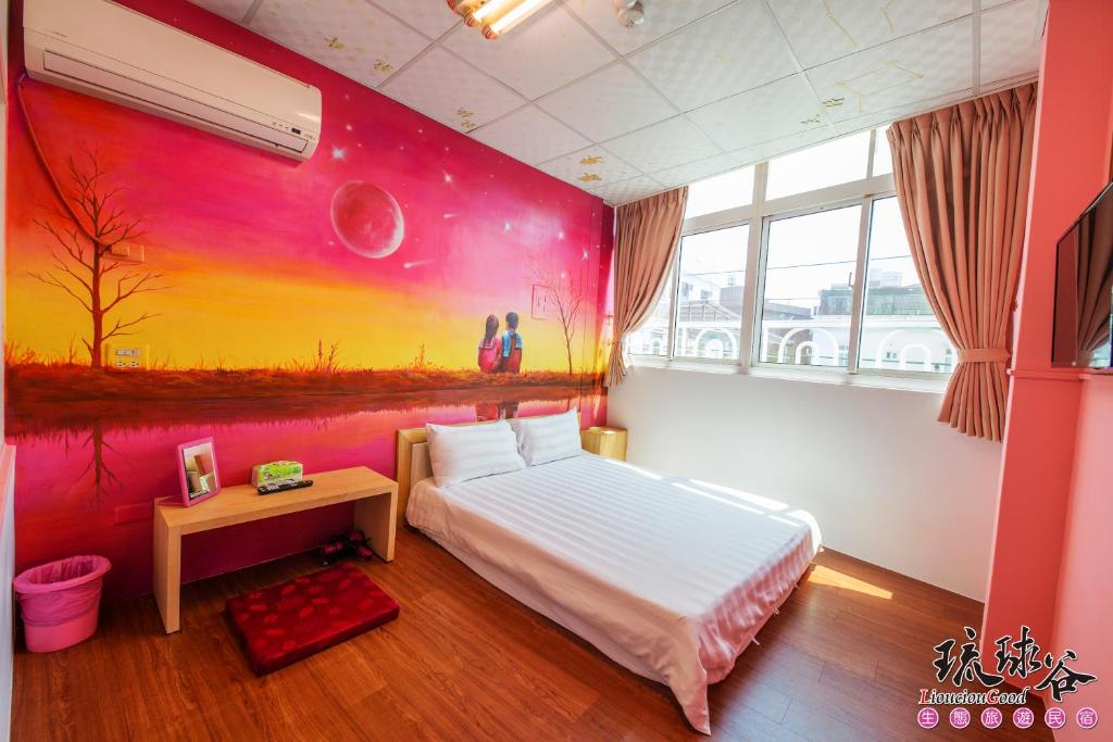 Postel nebo postele na pokoji v ubytování Liouciou Good Homestay