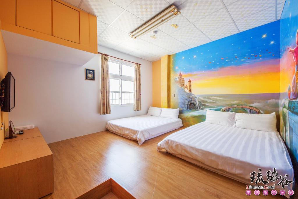 Postel nebo postele na pokoji v ubytování Liouciou Good Homestay