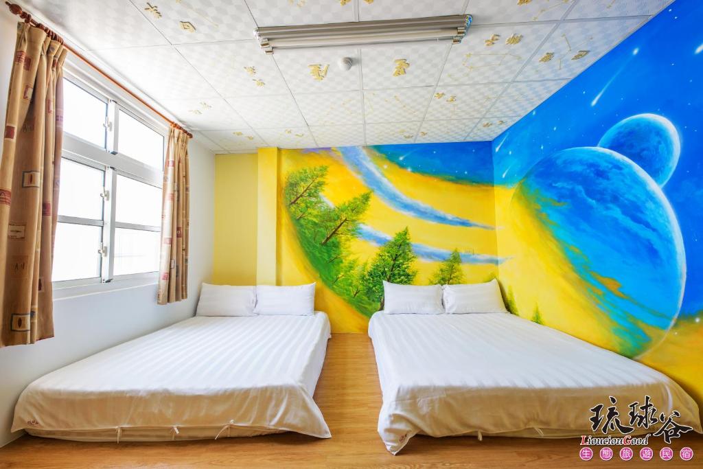 Postel nebo postele na pokoji v ubytování Liouciou Good Homestay