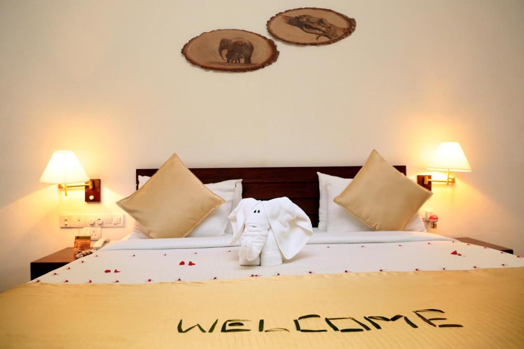 Postel nebo postele na pokoji v ubytování Grand Udawalawe Safari Resort