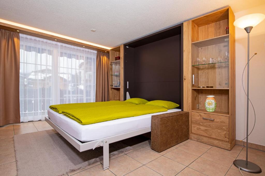 Postel nebo postele na pokoji v ubytování Apartment Aura