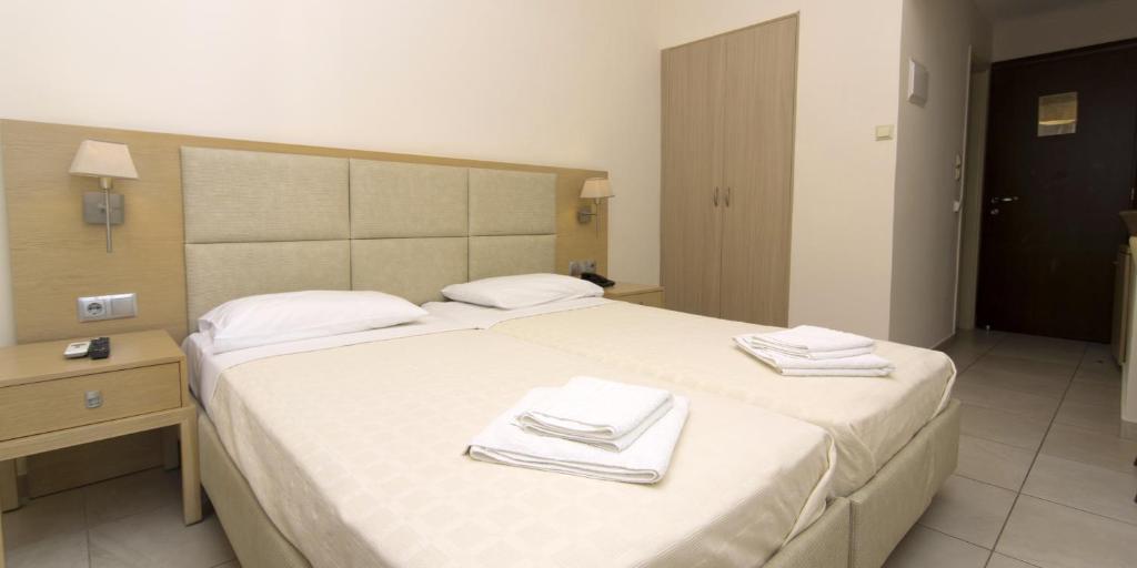 Postel nebo postele na pokoji v ubytování San Nectarios
