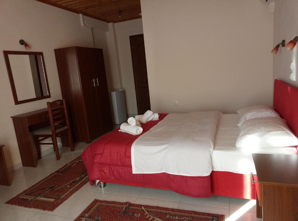 Postel nebo postele na pokoji v ubytování Evridiki
