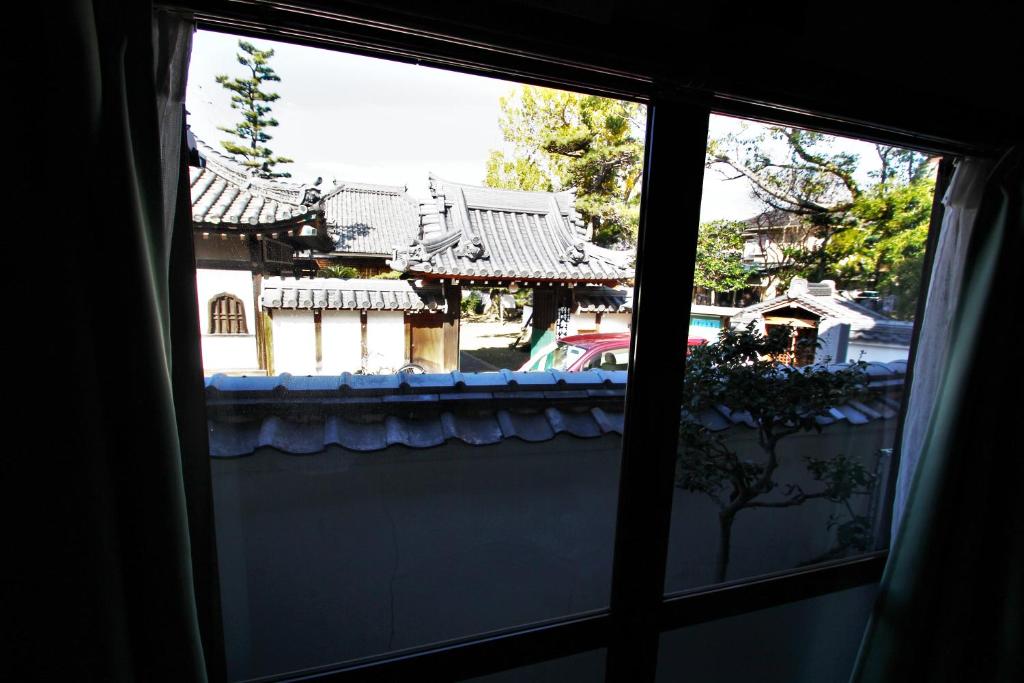 Fotografie z fotogalerie ubytování ゲストハウス喜平 v destinaci Kaizuka