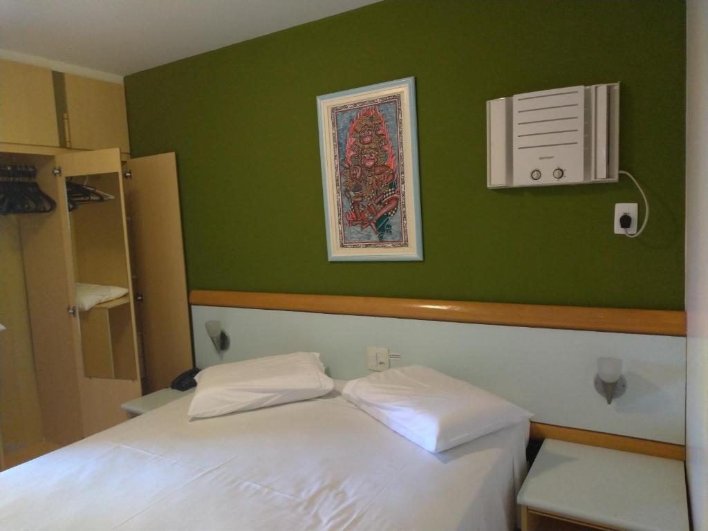 Postel nebo postele na pokoji v ubytování Apart Hotel Quartier Latin