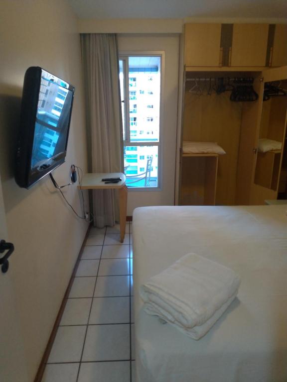 Postel nebo postele na pokoji v ubytování Apart Hotel Quartier Latin