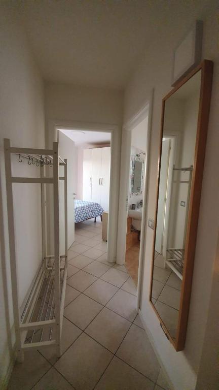 Postel nebo postele na pokoji v ubytování APPARTAMENTI TICINO