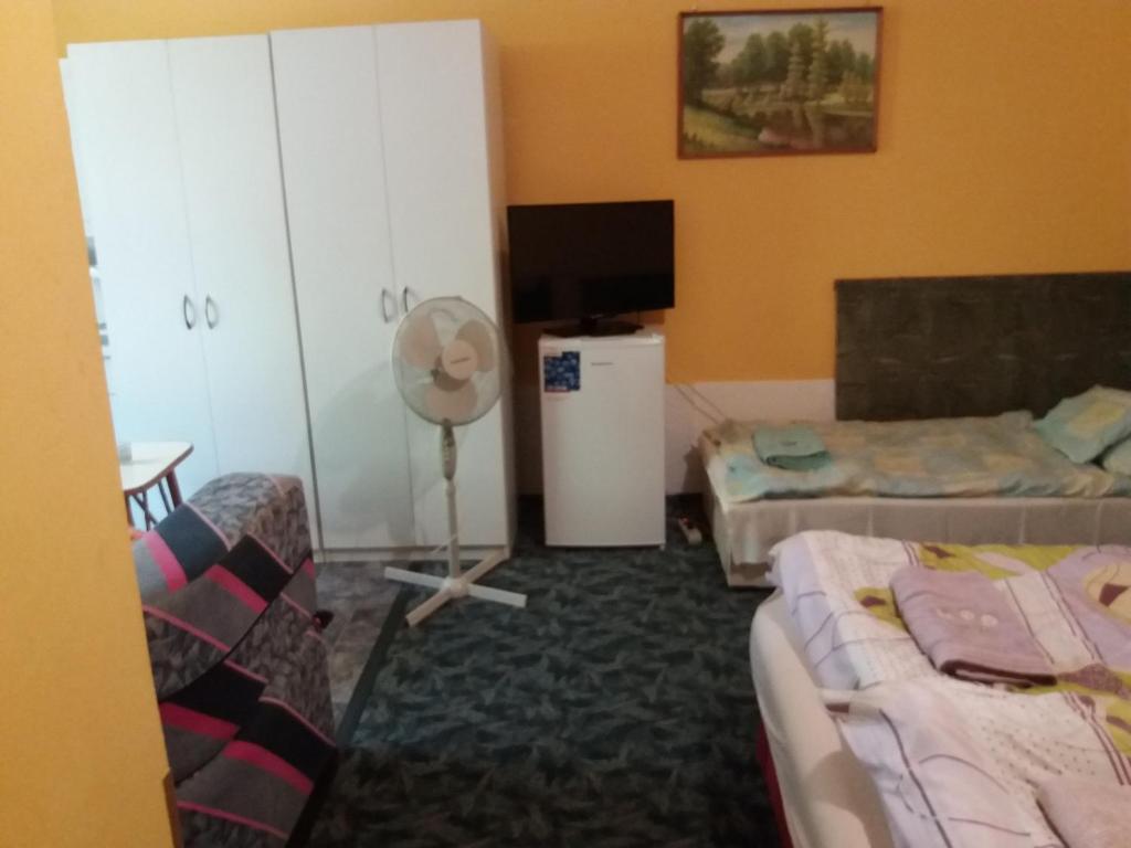 Postel nebo postele na pokoji v ubytování Lillafüred Kapuja Hotel