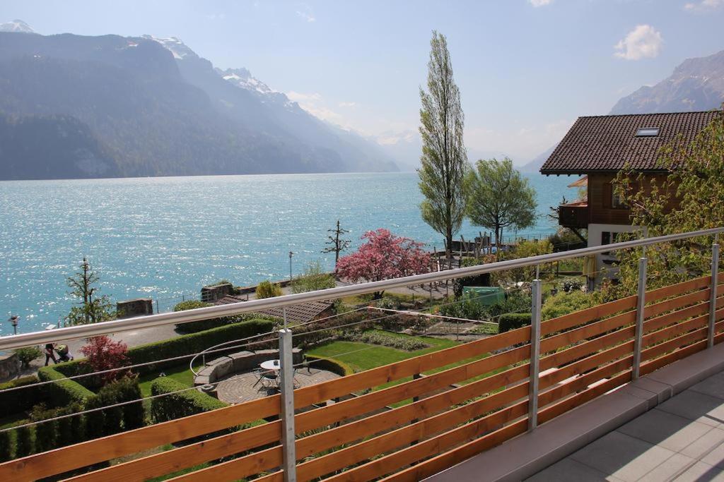 a balcony with a view of a lake at Holiday Apartment Heidi in Brienz