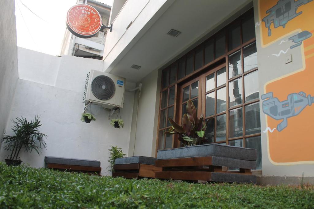 a building with a speaker on the side of it at Layover Colombo in Colombo