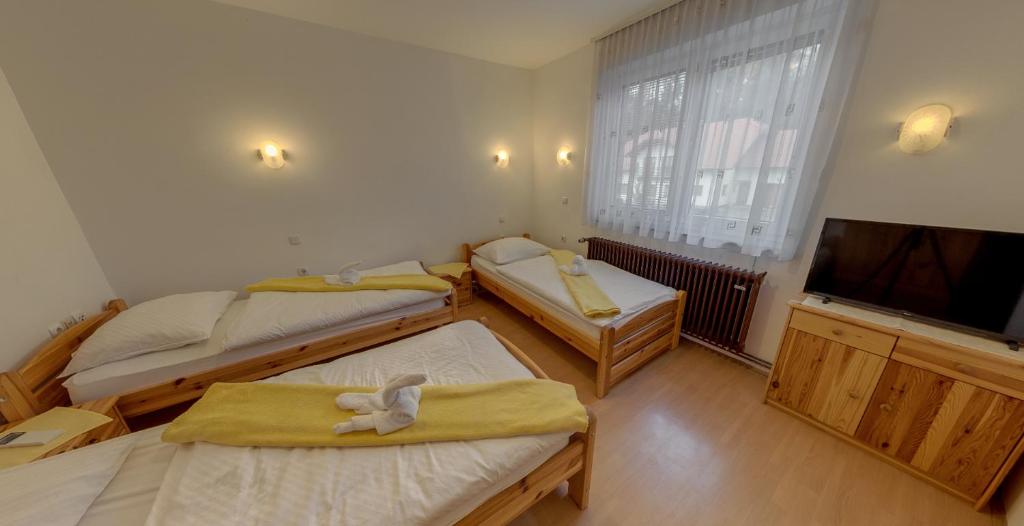 Postel nebo postele na pokoji v ubytování Gostisce Golob