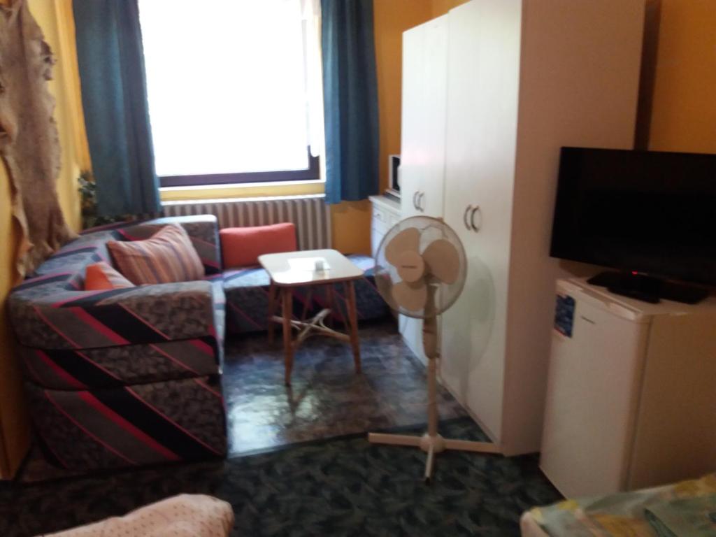 TV a/nebo společenská místnost v ubytování Lillafüred Kapuja Hotel