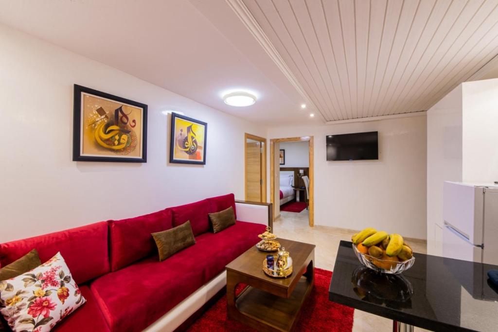 TV a/nebo společenská místnost v ubytování Appart-hotel Marrakech Inn