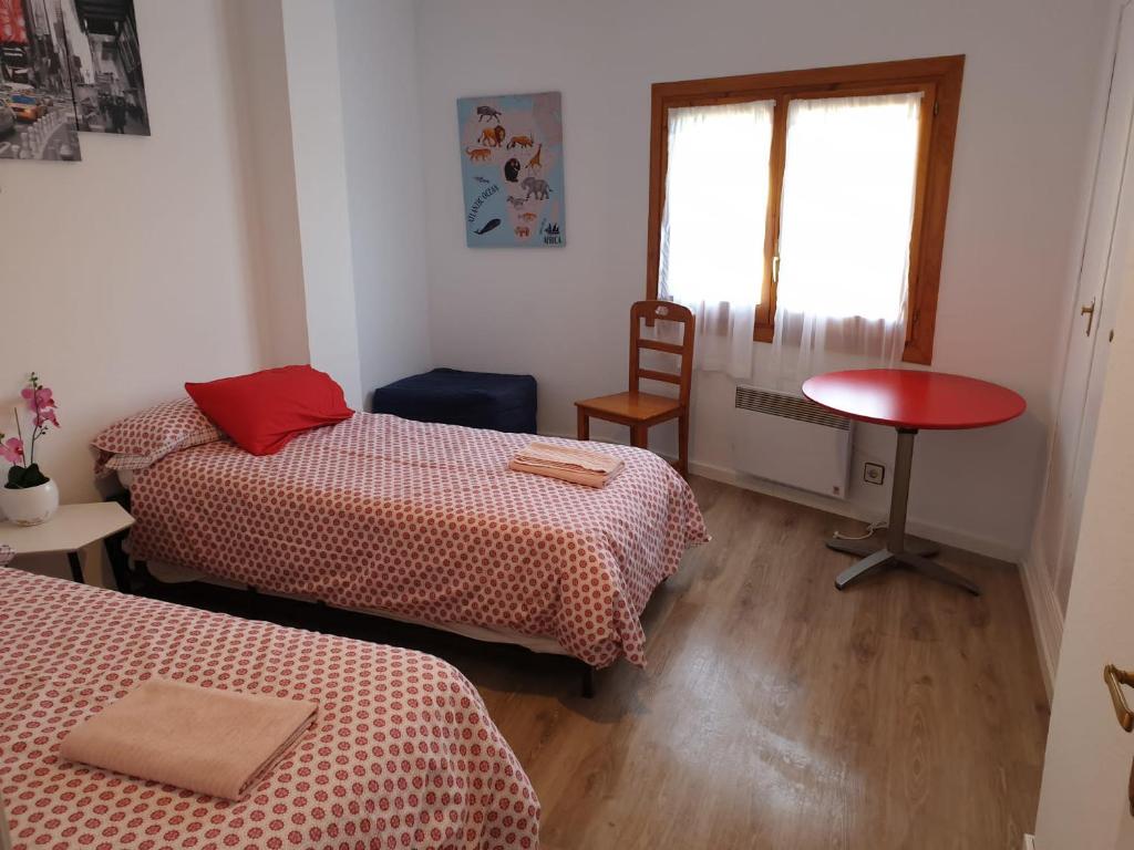 Postel nebo postele na pokoji v ubytování Apartamento Montes blancos