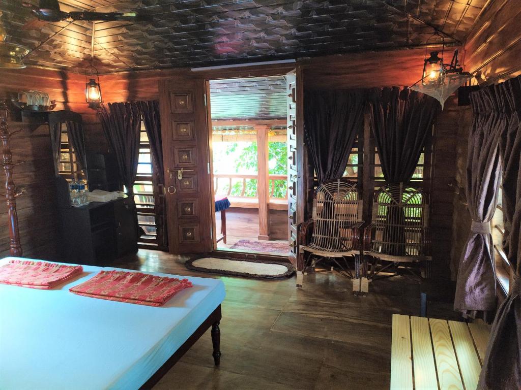Postel nebo postele na pokoji v ubytování Sea Hut Homestay