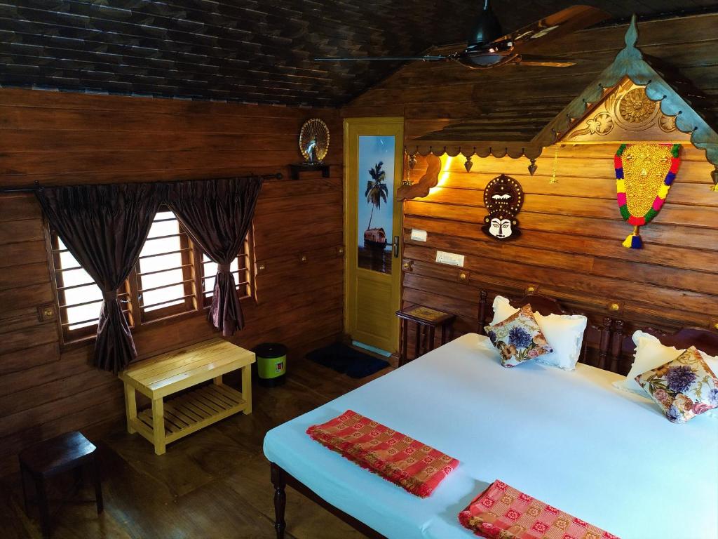 Postel nebo postele na pokoji v ubytování Sea Hut Homestay