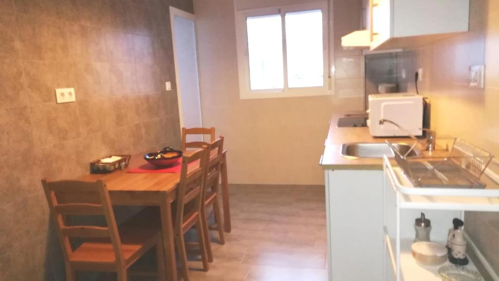 Kuchyňa alebo kuchynka v ubytovaní P.B. Apartamento