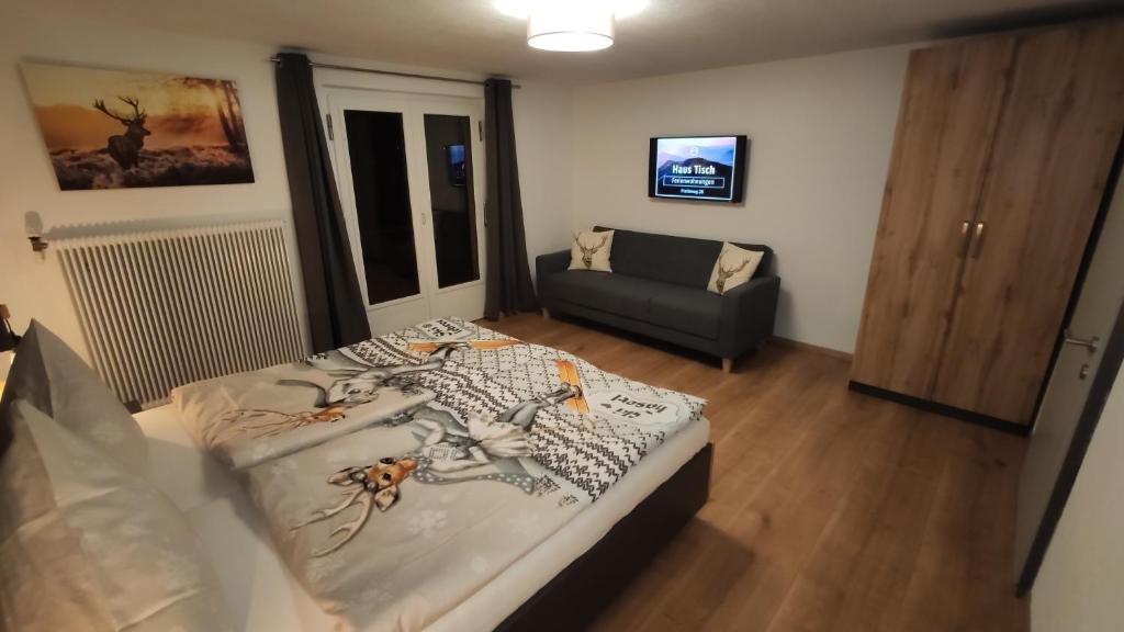 Postel nebo postele na pokoji v ubytování Haus Tisch