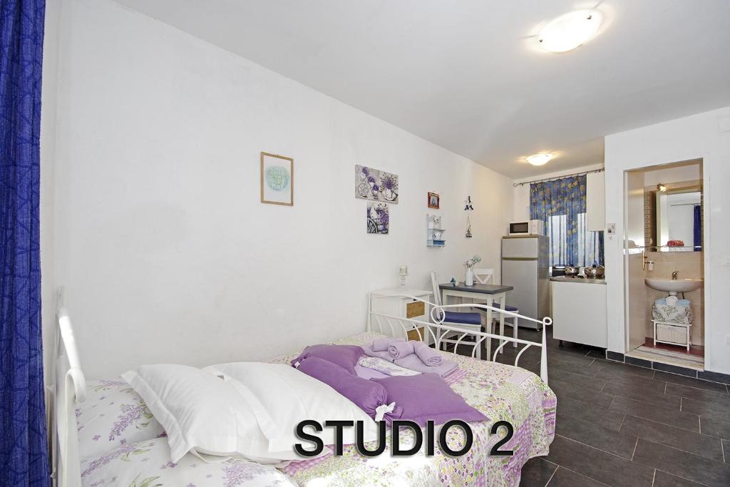 Kuchyň nebo kuchyňský kout v ubytování Villa Igrane