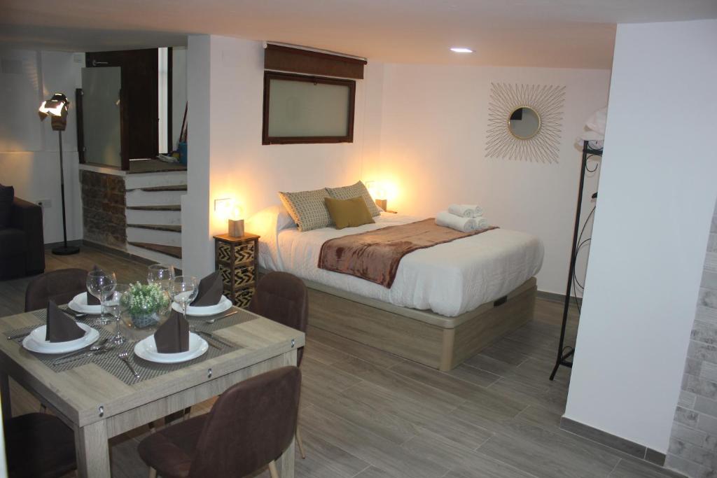 A bed or beds in a room at Loft Turístico en casco histórico, Wifi y TV satélite gratis