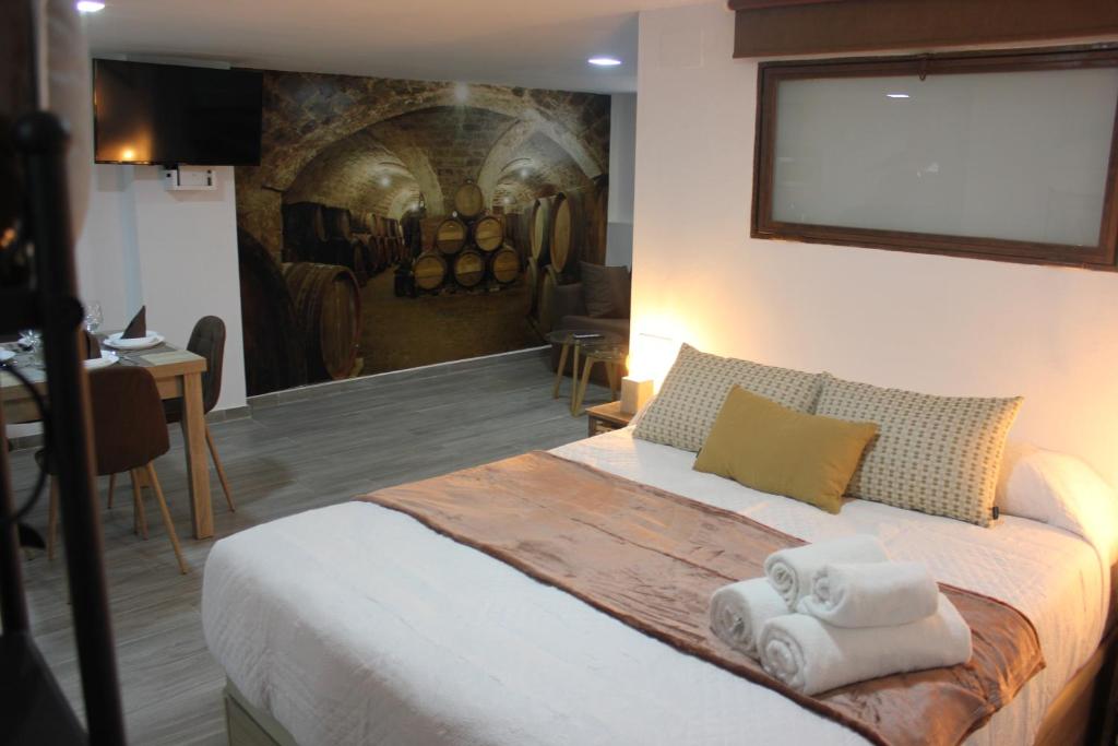 A bed or beds in a room at Loft Turístico en casco histórico, Wifi y TV satélite gratis