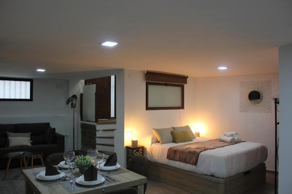 A bed or beds in a room at Loft Turístico en casco histórico, Wifi y TV satélite gratis