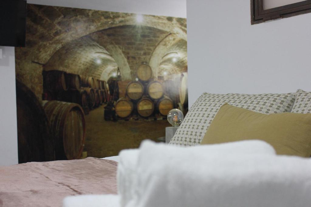 A bed or beds in a room at Loft Turístico en casco histórico, Wifi y TV satélite gratis