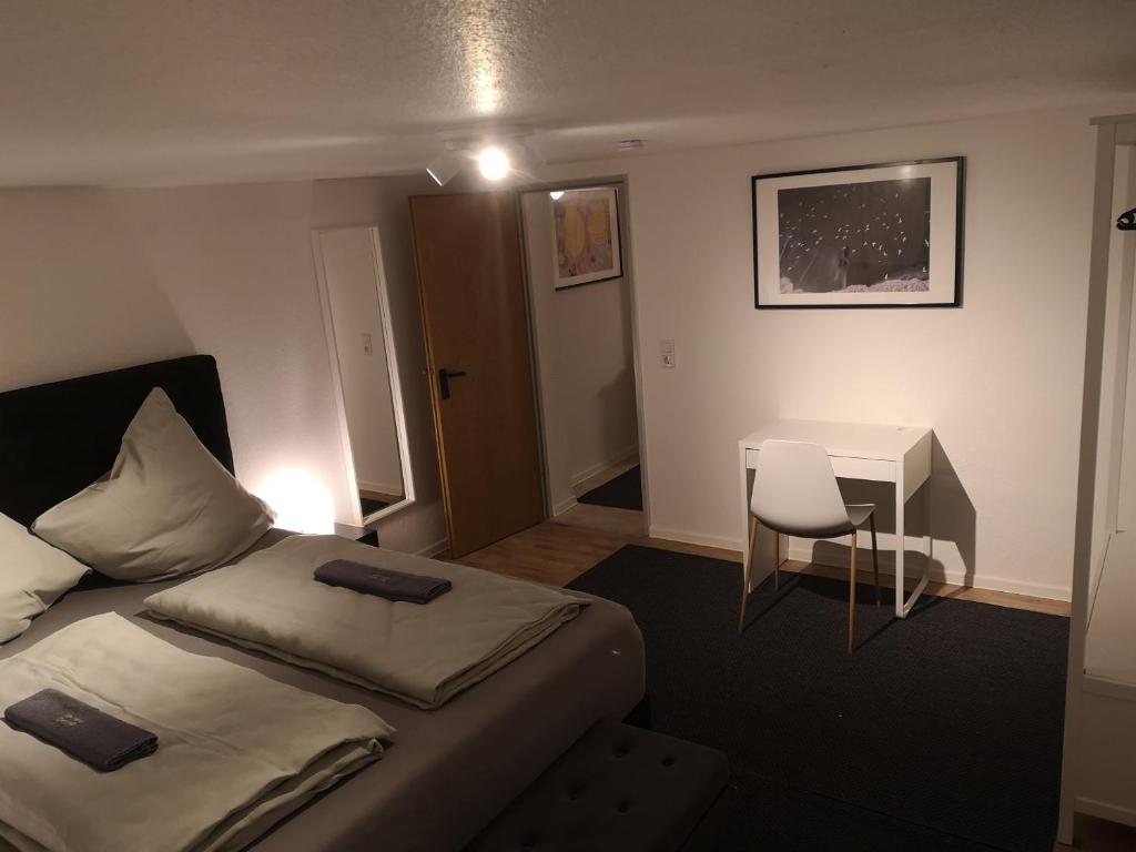 Postel nebo postele na pokoji v ubytování Ferienwohnung Nomeda