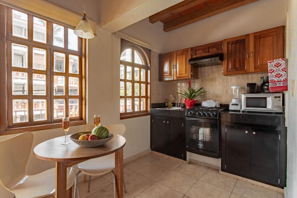 Kuchyň nebo kuchyňský kout v ubytování Olas Altas Suites Departamentos