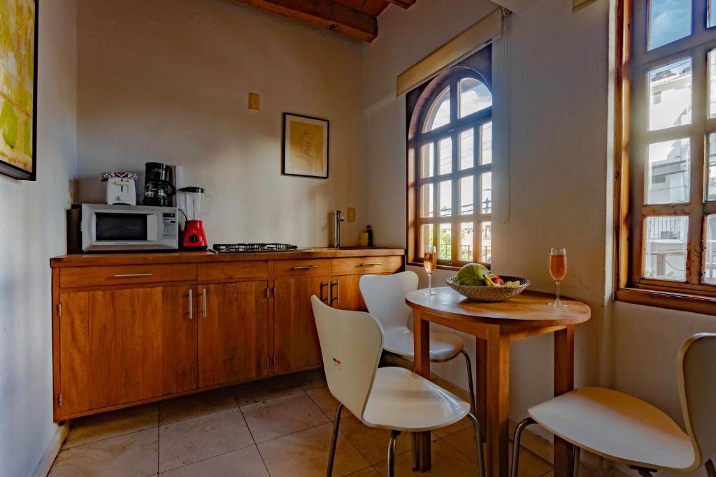 Kuchyň nebo kuchyňský kout v ubytování Olas Altas Suites Departamentos