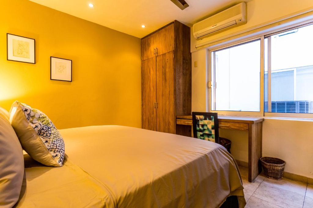 Postel nebo postele na pokoji v ubytování Olas Altas Suites Departamentos