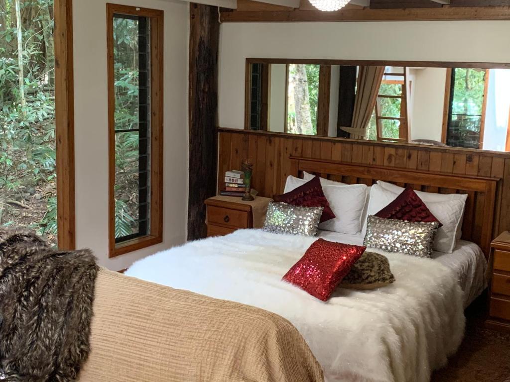Ein Bett oder Betten in einem Zimmer der Unterkunft Figtree Getaway